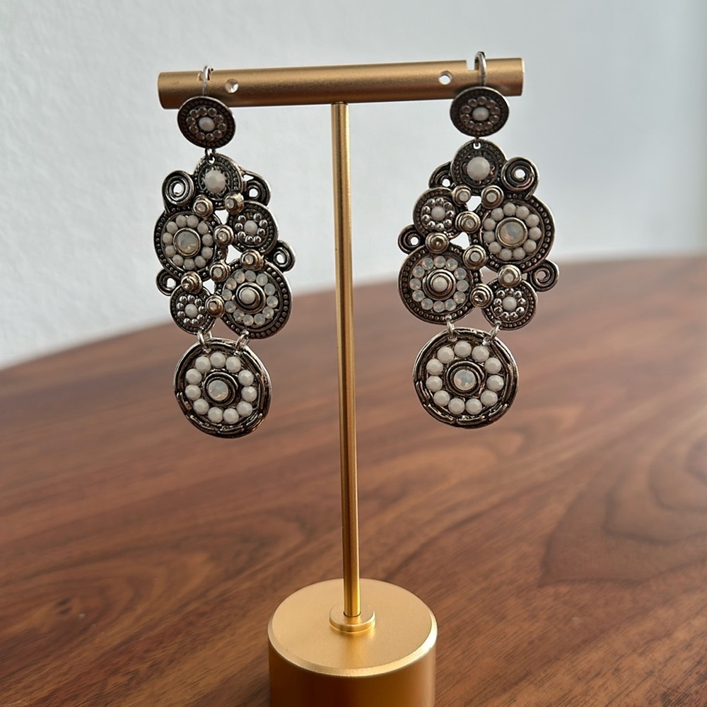 Silver and white earrings